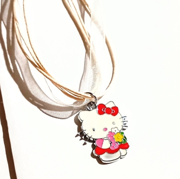 Hello Kitty Holding Flower Bouquet Wearing Red Dress Ribbon Necklace - Picture 7 of 7